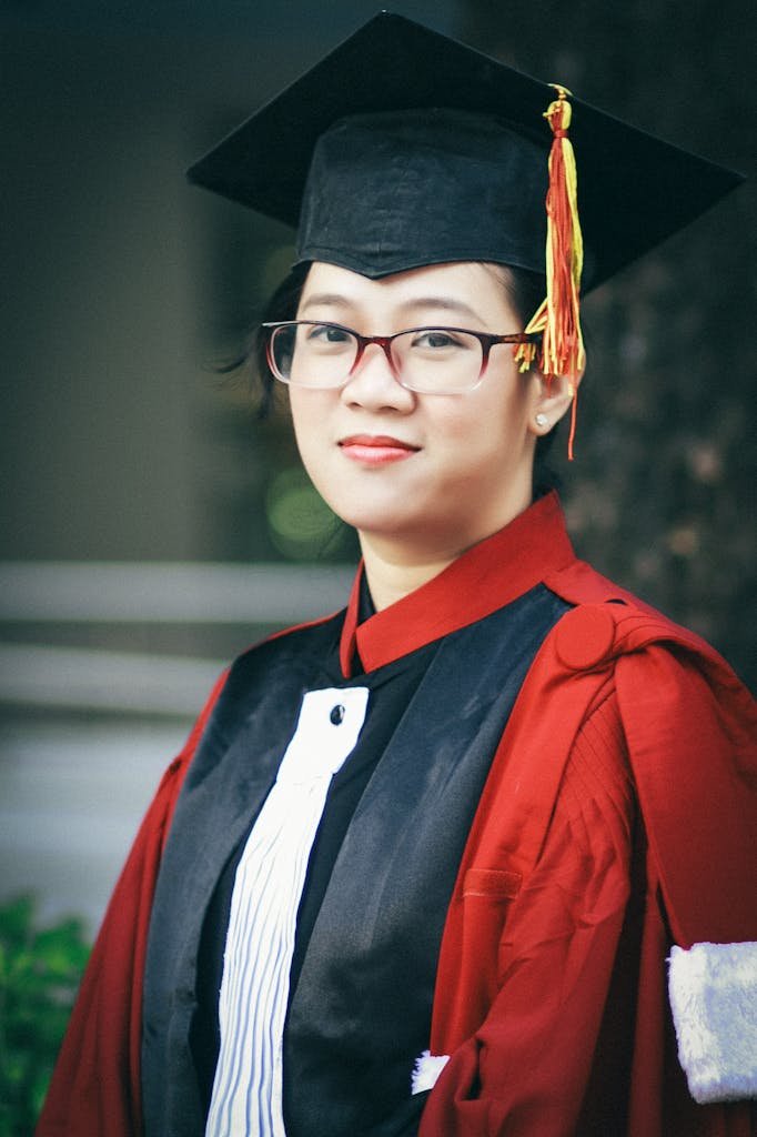 Portrait of a young woman in graduation attire, celebrating academic success.